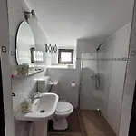 Casa Octaral Gazde/Camere de închiriat